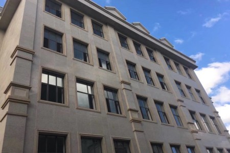 湖北随州矿山厂家黄金麻花岗岩荔枝面火烧面石材外墙干挂案例