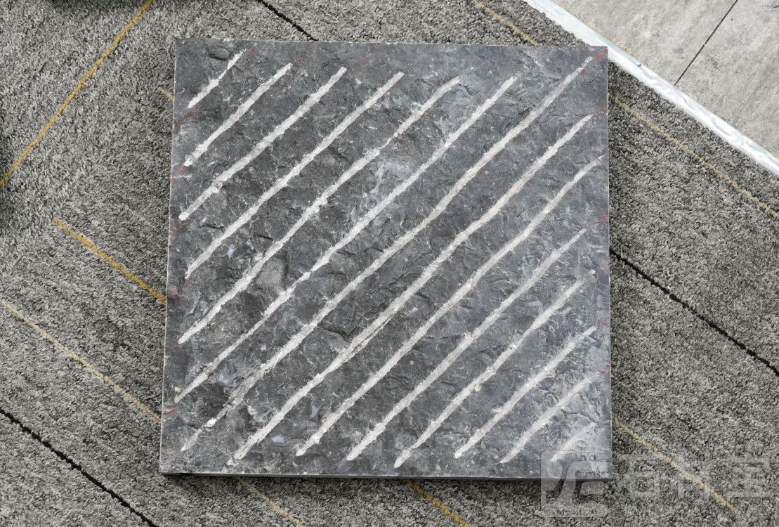 金沙黑·中国黑斜凿面