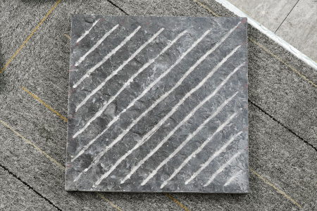 金沙黑·中国黑斜凿面